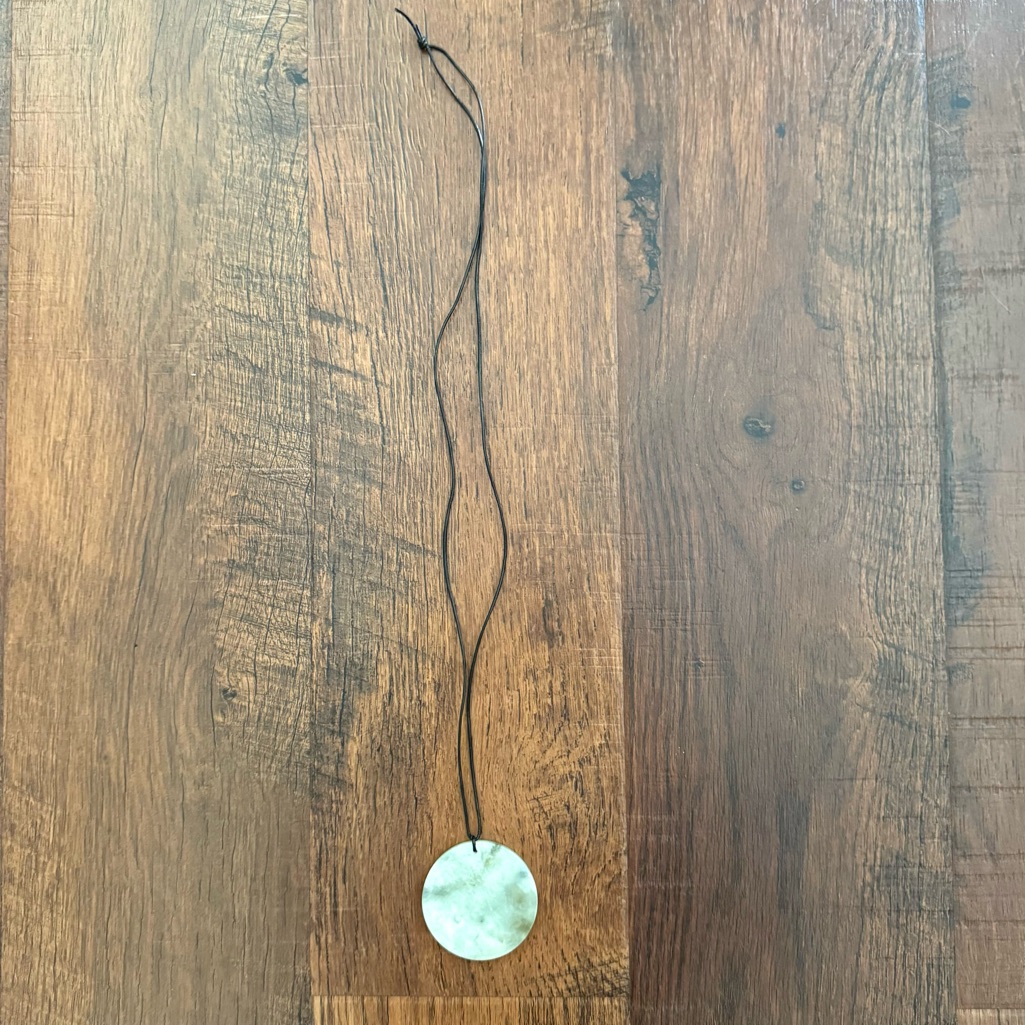 Carved Jadeite Pendant Necklace On Adjustable Cord.